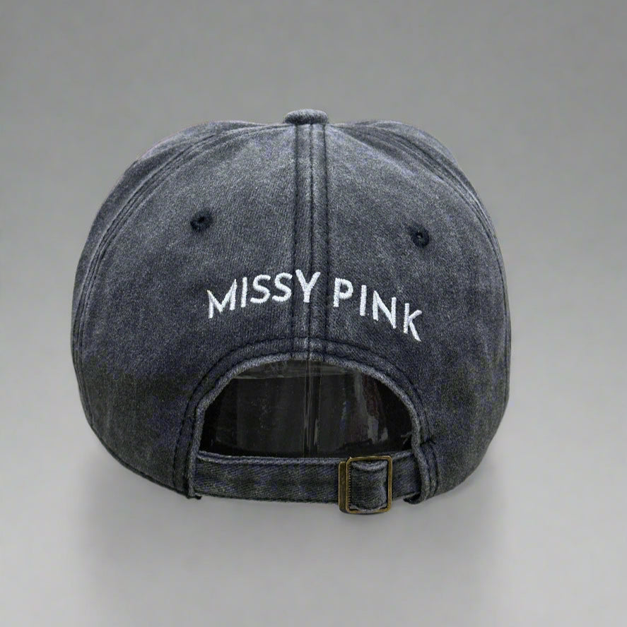 Gray cap with 'MISSY PINK' text on a gray background